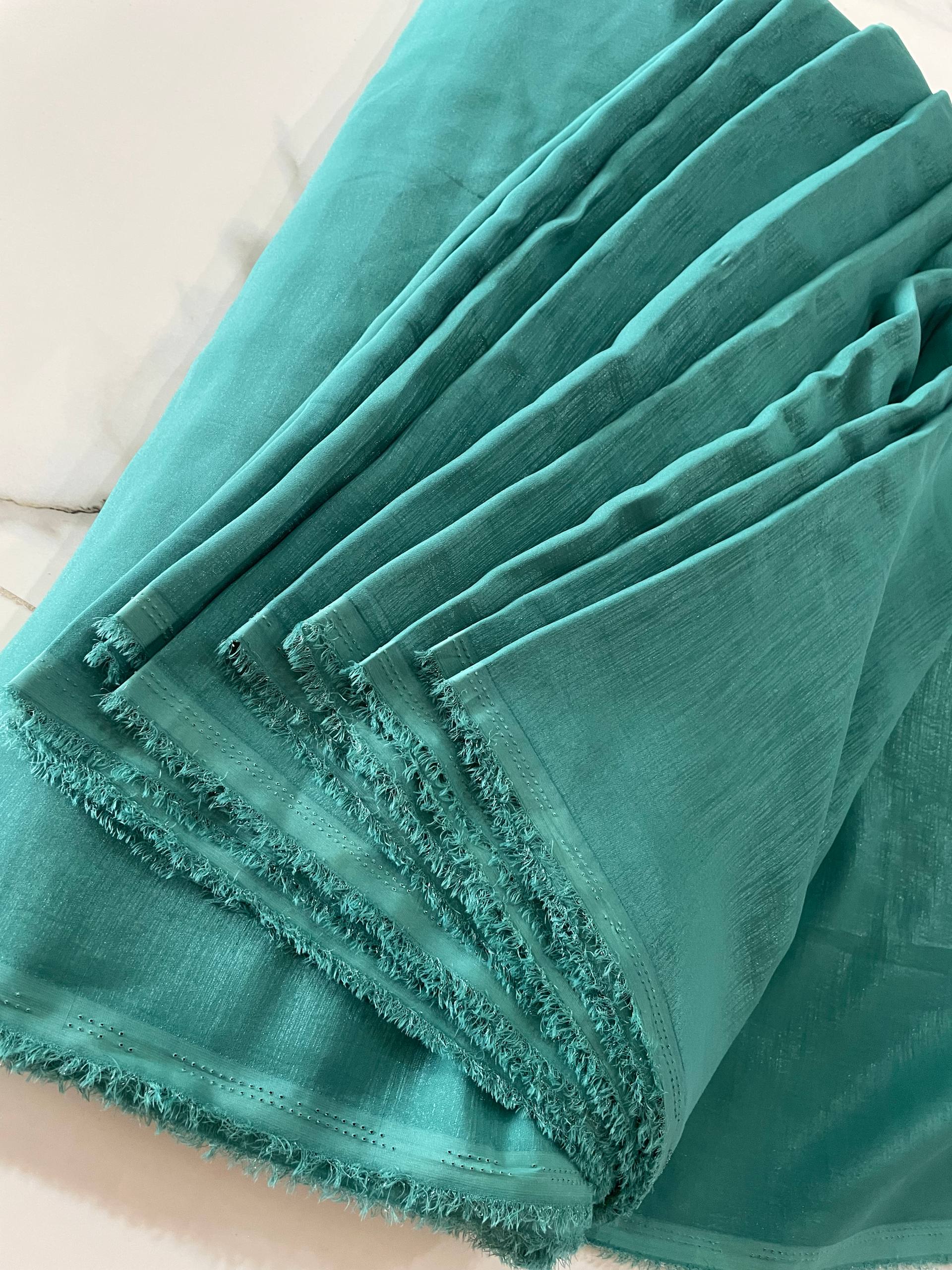 Turquoise Crepe Fabric