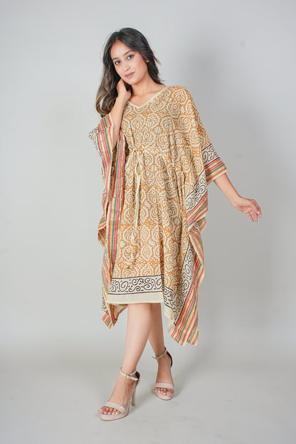 Girl wearing Hand Block Printed Cotton Kaftan Dress – Mustard Floral Jaal with Ethnic Borders