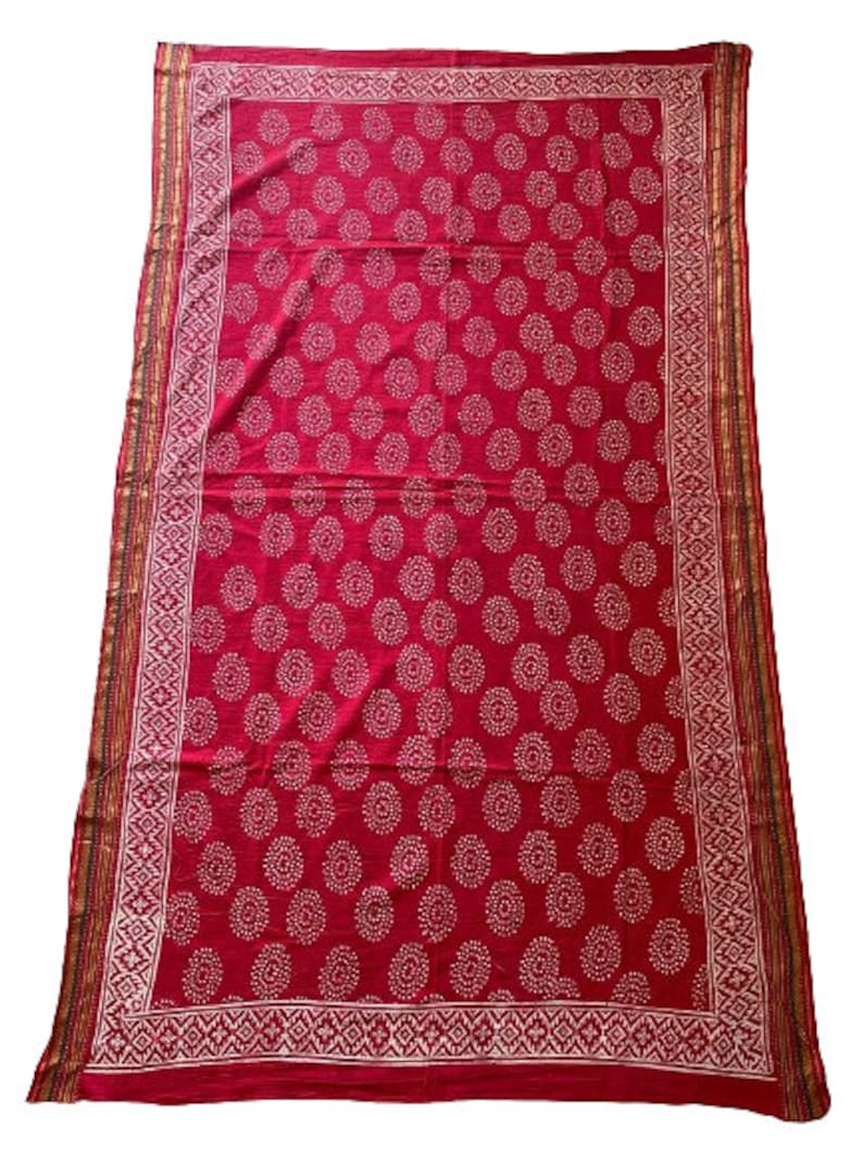 red sarong with silk border